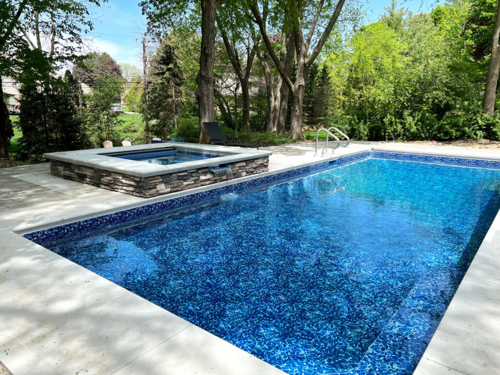 Northville_Pool_and_Spa_with_hardscape_decking_and_landscape2.jpg