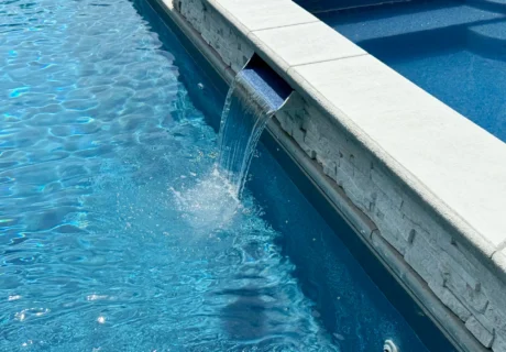 Raised Spa Pool spill over water feature - Dig2Swim